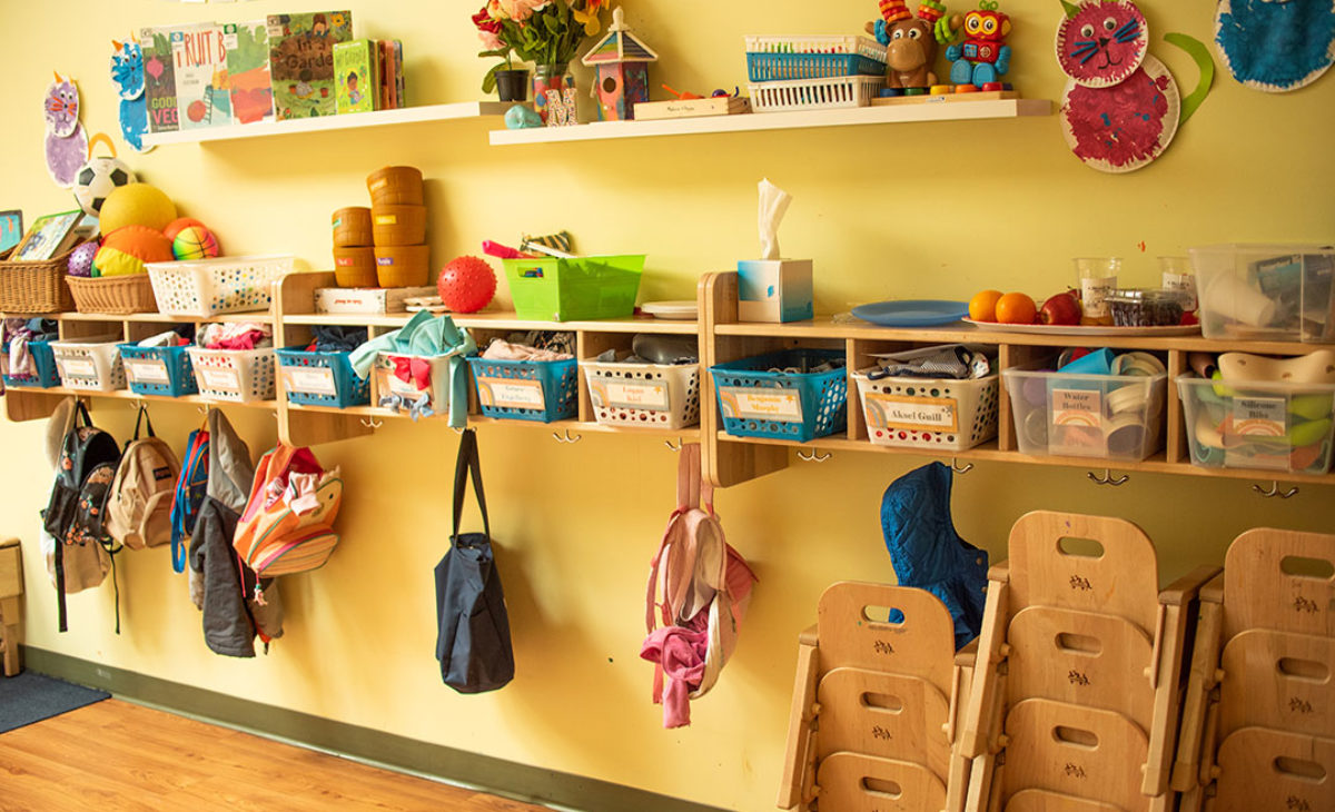 Shelves containing student belongings and backpacks