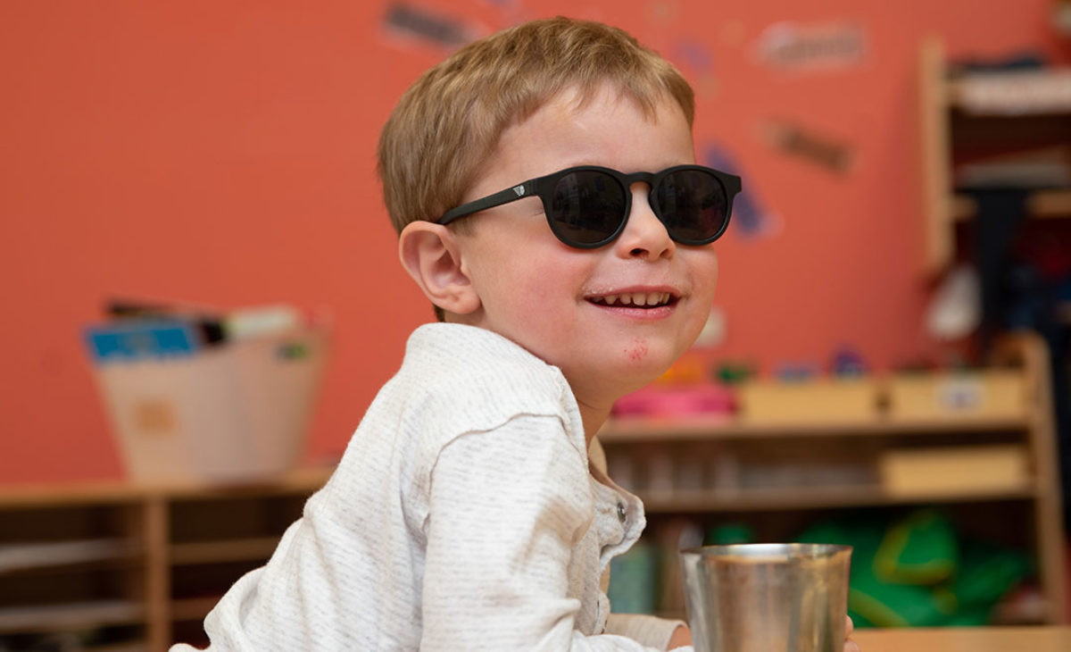 Young toddler boy smiling