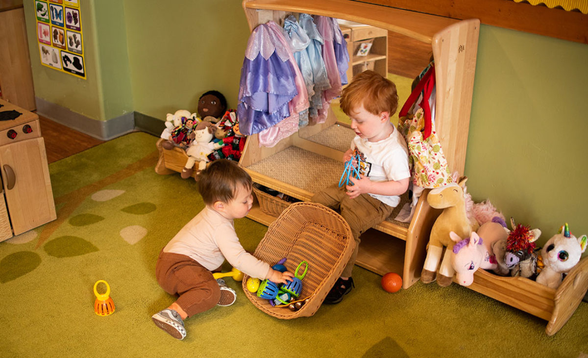 2 toddler boys playing together